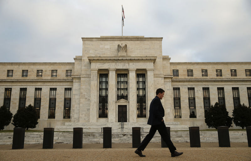 Fed Accelerates Bond Tapering, Sees Earlier Rate Hikes to Curb Inflation
