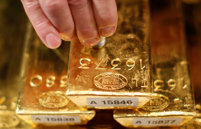 Gold prices near 11-mth high as markets gauge Fed liquidity measures