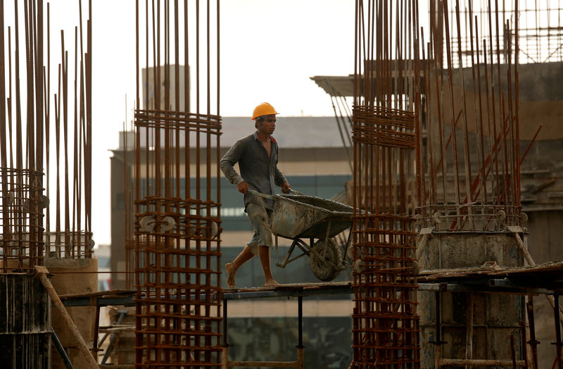 India lowers tax on new home sales ahead of general election