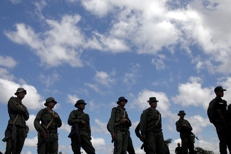 Venezuelan troops open fire near border as aid standoff intensifies