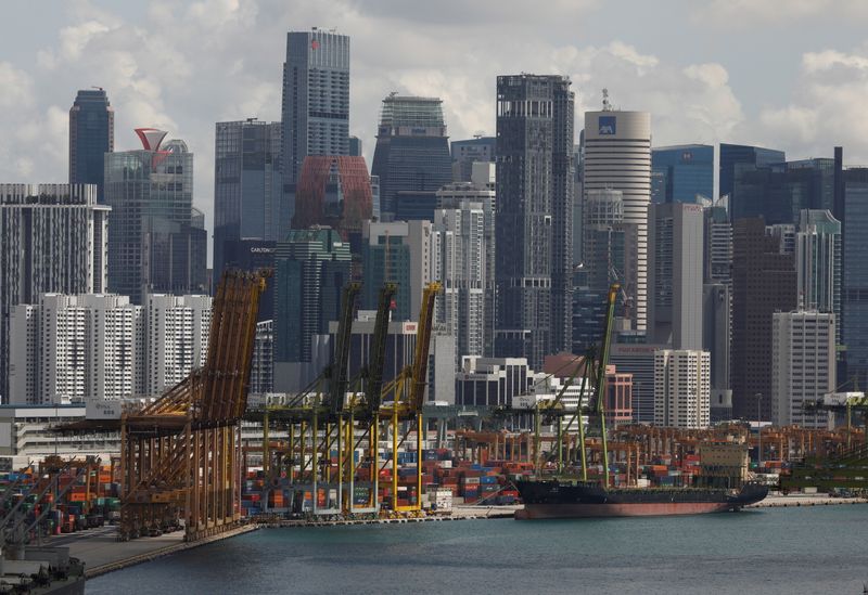 Singapore to forge on with economic recovery, central bank on hold