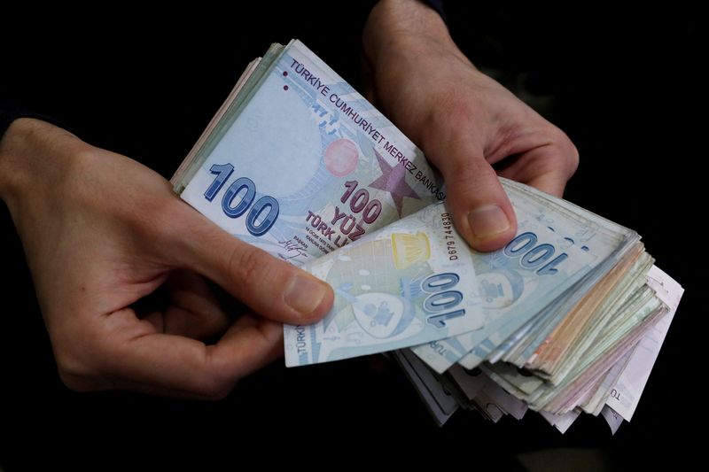 Exclusive-Turkish bank employees compelled to boost lira-defence scheme -sources