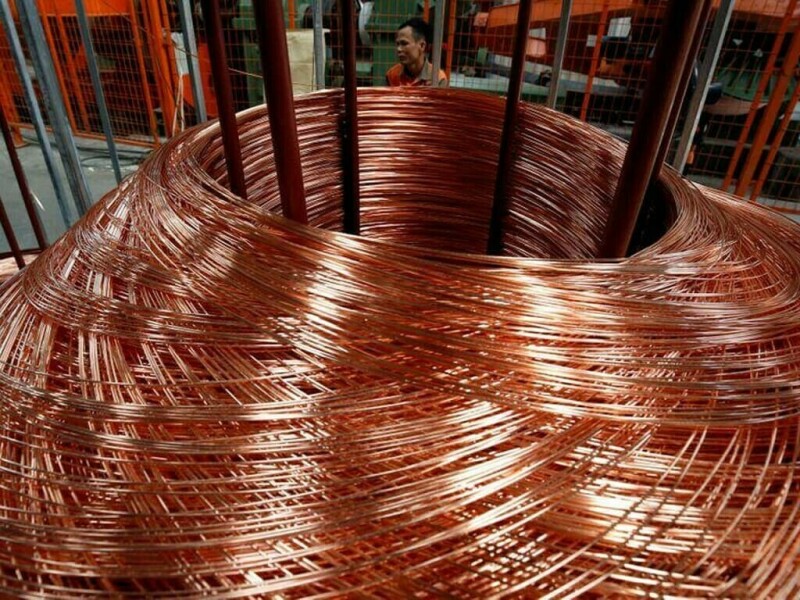 Copper slips as upbeat dollar, high inventories weigh