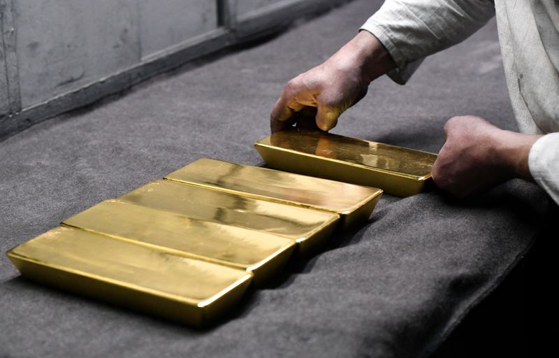 Gold hits over 1-week high on Middle East worries, cautious Fed