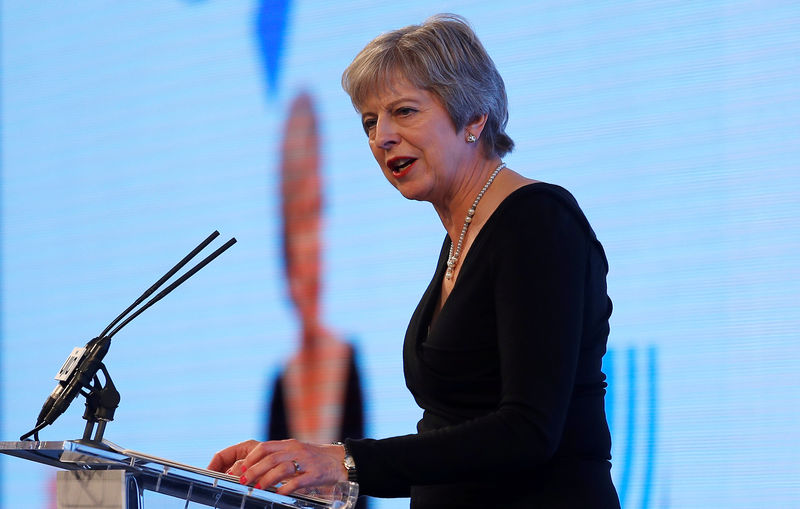 Affordable housing to get 2 billion pound boost in UK, PM May says