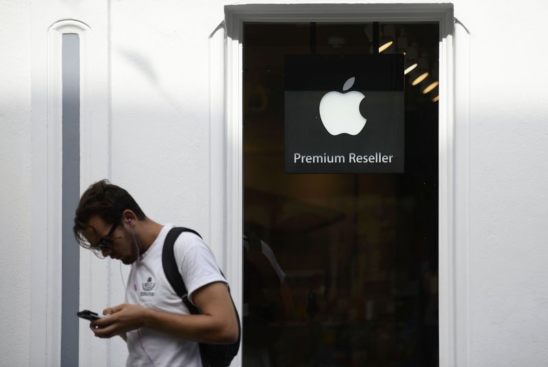 Apple stock opens 3% lower after Barclays cut to sell on 