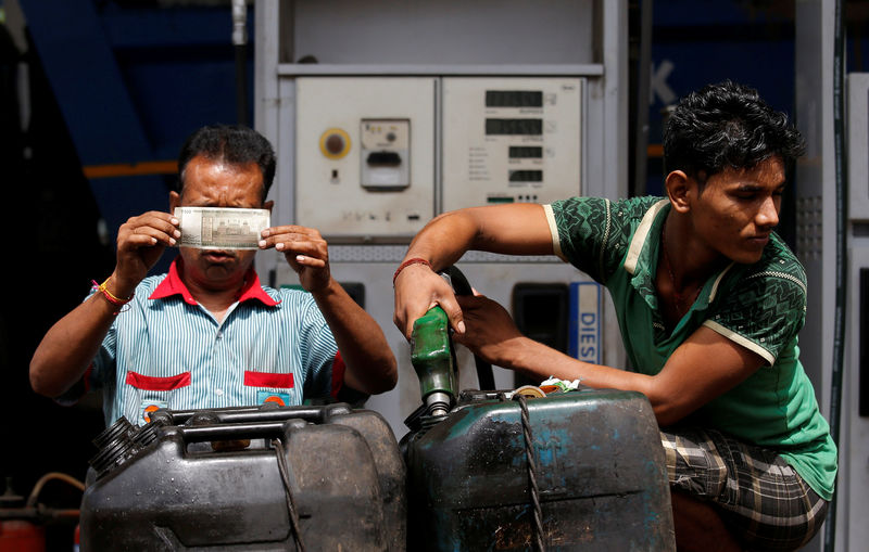 As petrol prices sky-rocket, Indians look for ways to ease the pain