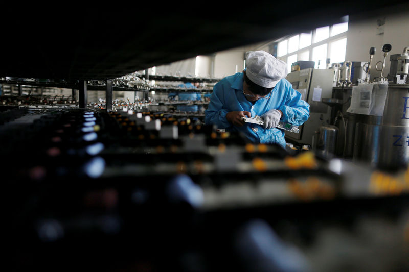 Asian factories kick off 2018 on strong note, but inflation still missing