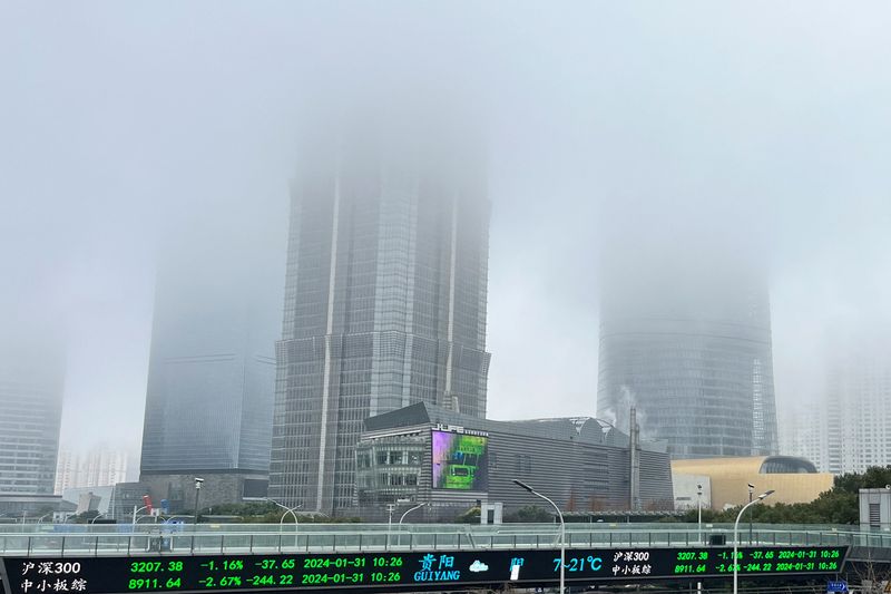 Asian stocks slump as traders temper rate cut bets