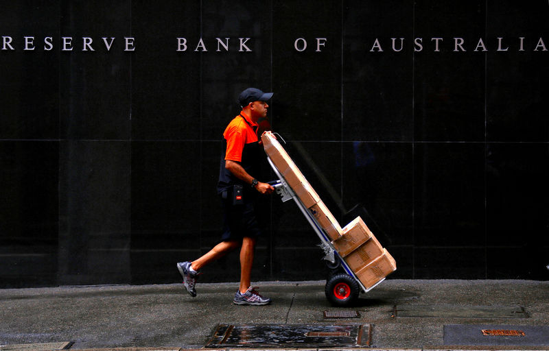 Australia central bank calm as house prices skid, watching credit supply