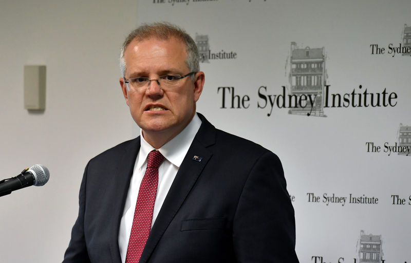 Australia government sees bigger budget surpluses ahead