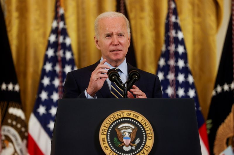 Biden warns Putin of sanctions, aid for Ukraine military if Russia invades