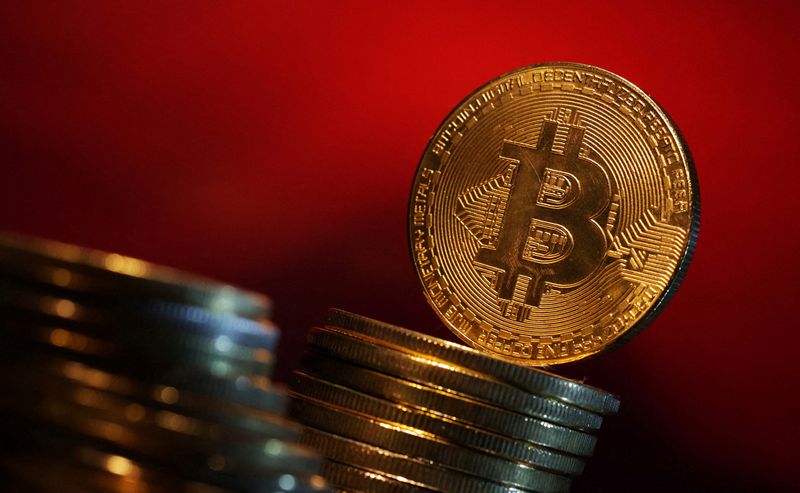 Bitcoin briefly rises to record high over ,000