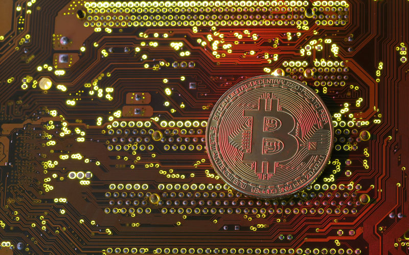 Bitcoin extends gains, rises above ,000 to record high