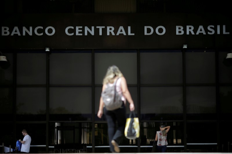 Brazil central bank set to taper rate cuts near record low