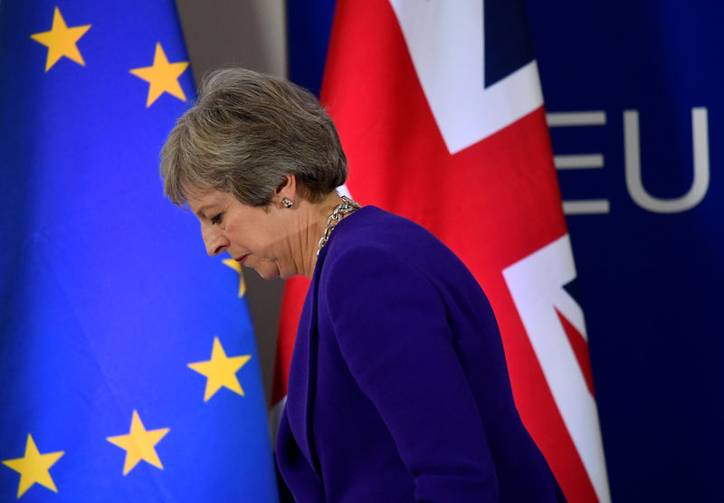 British PM May tries to sell Brexit deal to ministers