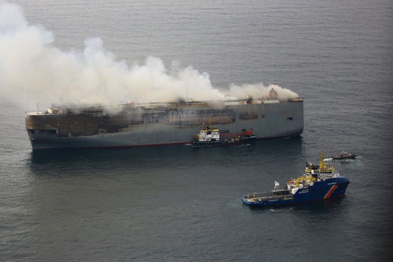 Burning car carrier off Dutch coast being towed away from shipping lanes