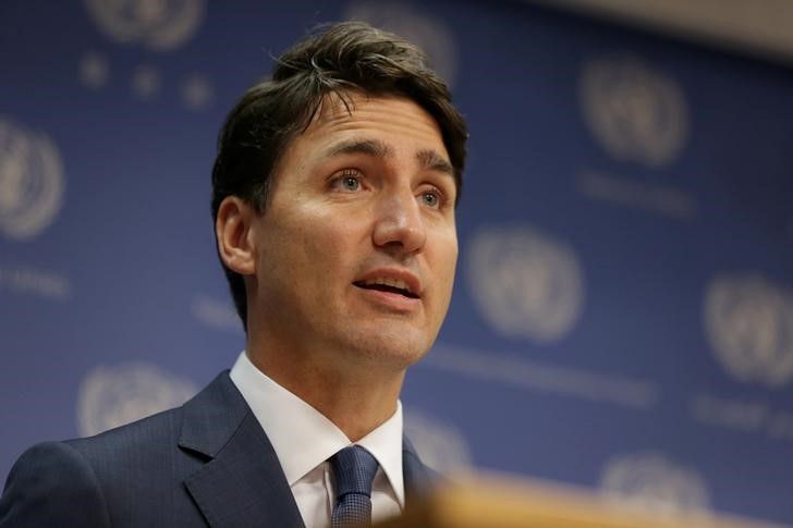 Canada PM takes Quebec dairy gamble to preserve big trade deal