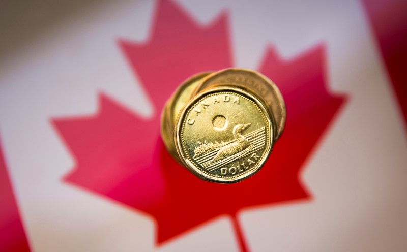 Canadian dollar forecast to overcome trade worries and strengthen: Reuters poll