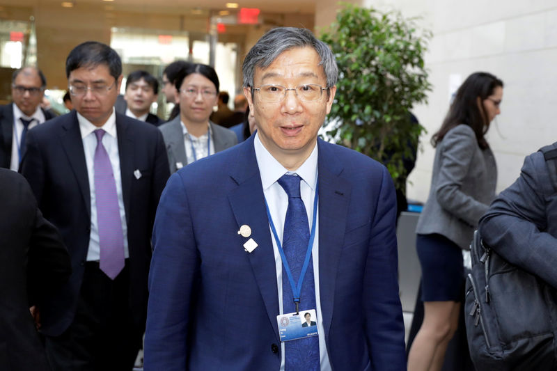 China central bank governor calls for further financial opening