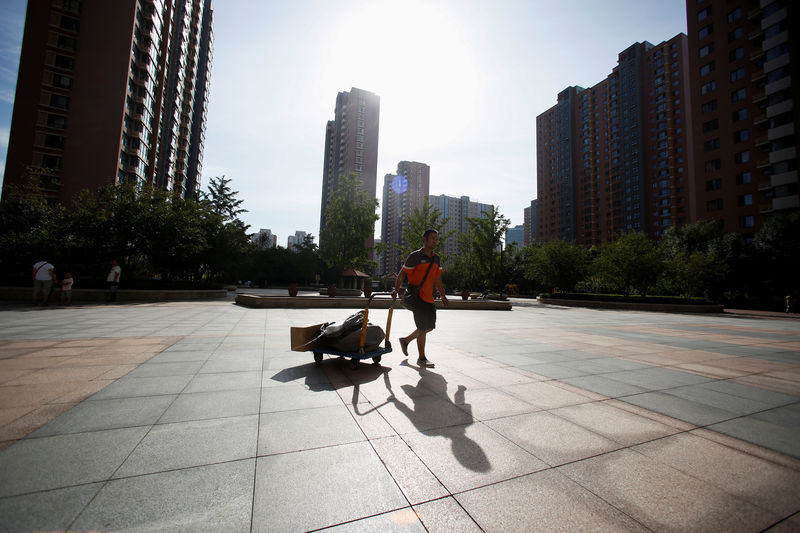 China property sales will slow in fourth quarter, prices stable-housing minister