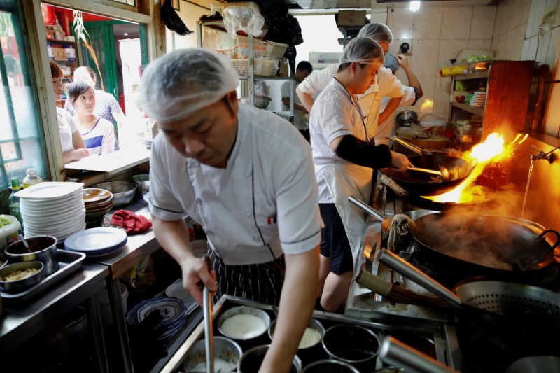 China services sector grows at fastest pace in 4 months in June - Caixin PMI