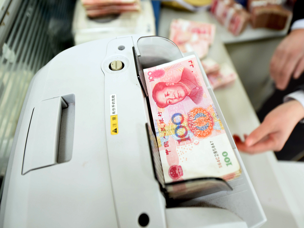 China’s yuan at 14-mth low, Turkish lira hits record low