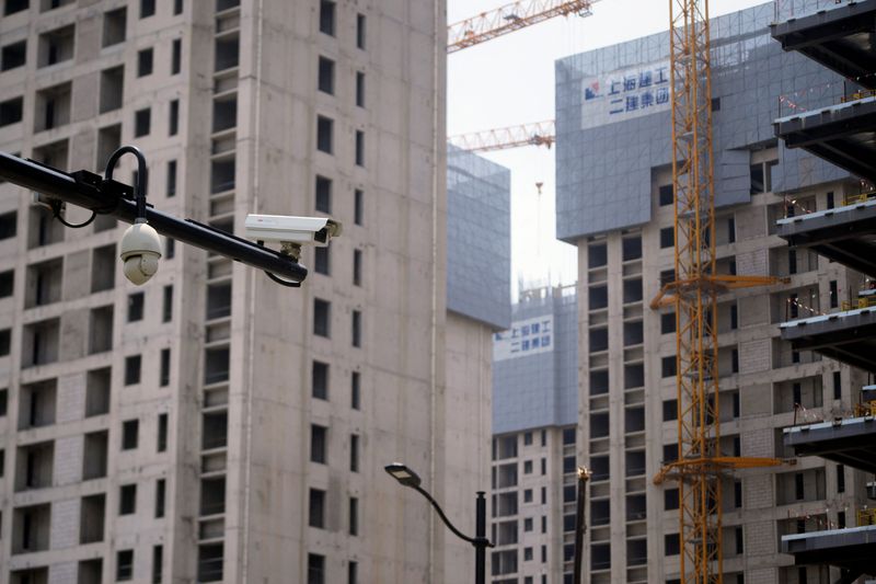 Chinese major cities ease home purchase limits to boost sales