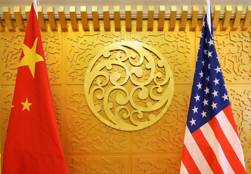 Chinese state media cautious as U.S. delegation flies in for trade talks