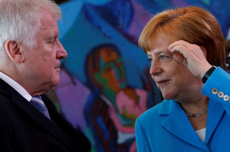 Defiant Merkel backs Europe migrant policy as Bavaria row simmers