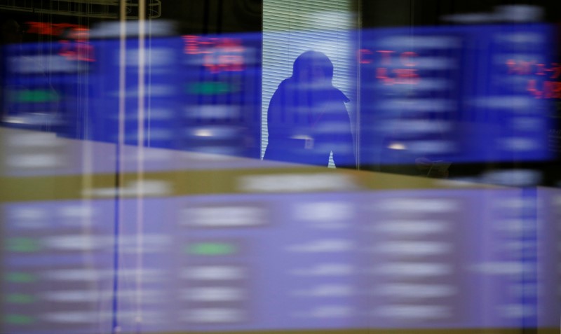 Despite Abe scandal, Japanese shares are among world