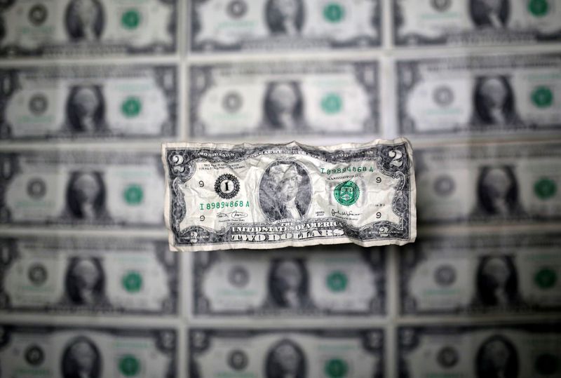 Dollar dips as traders focus on US rate cuts next year