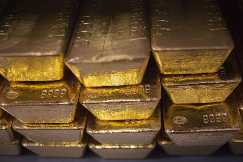 Gold at 1-mth low, copper steadies ahead of U.S. CPI