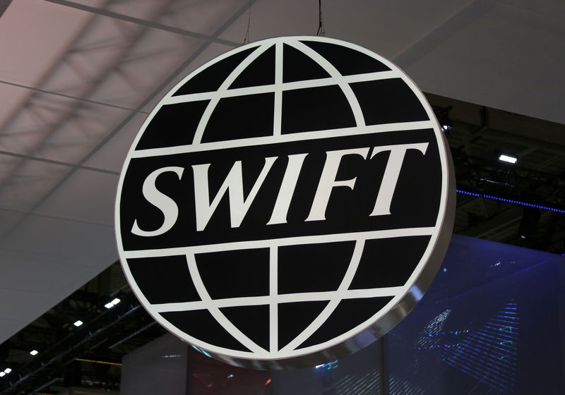 EU says SWIFT decision on Iran banks regrettable