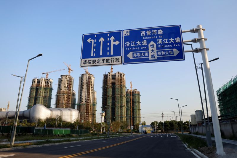 Evergrande misses payment deadline, EV unit warns of cash crunch