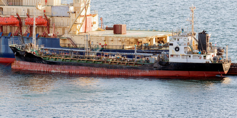 Exclusive: Despite sanctions, Russian tanker supplied fuel to North Korean ship-crew members