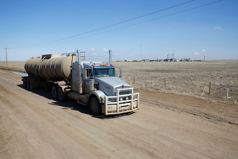 Facing shipping constraints, Canada moving oil one truckload at a time