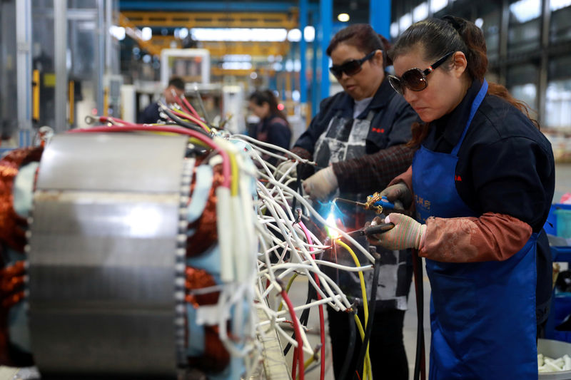 Factory activity shrinks across Asia as cooling China threatens global growth