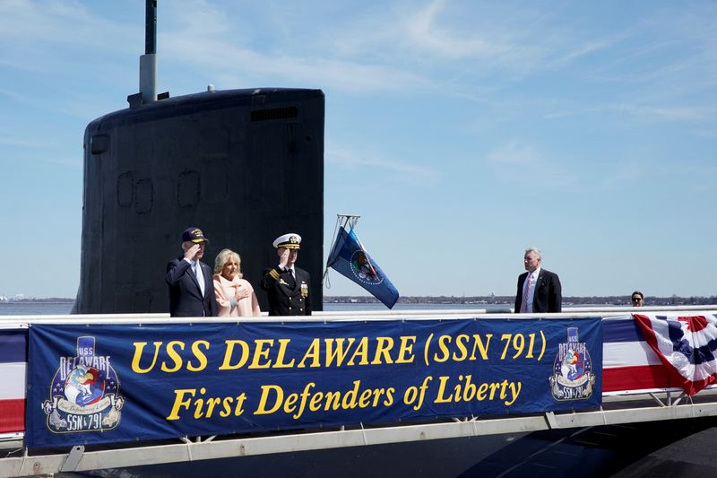 Fewer submarines, more police detectives: highlights of Biden