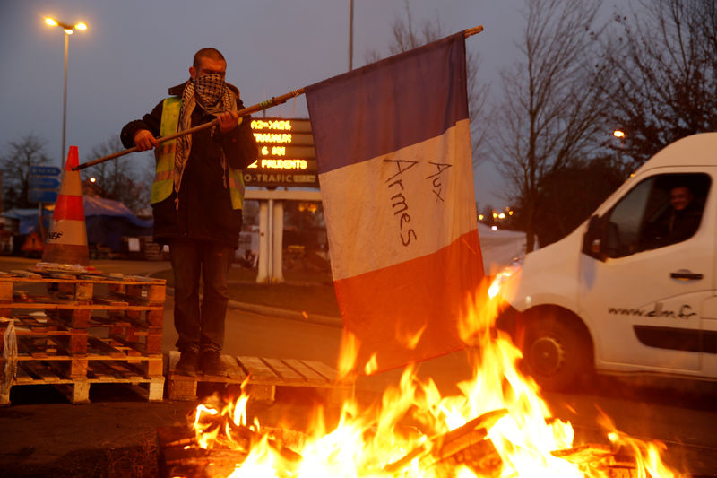 France drops fuel tax hike as 