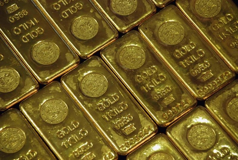 Gold Prices Hover Above Two-Week Lows as Bond Yields, Dollar Jump