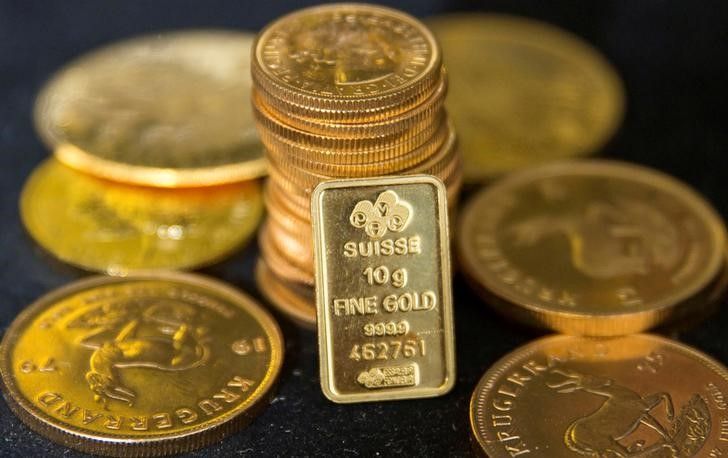 Gold eases in French election afterglow; safe-haven demand supports