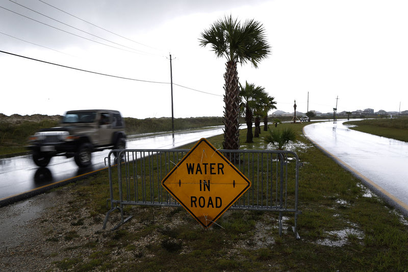 Gordon dumps heavy rains, Hurricane Florence barrels toward Bermuda