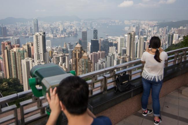 Hong Kong Trims Budget Handouts With Slowing Economy in View