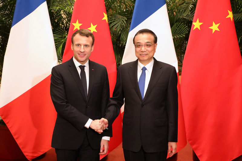 In China, Macron urges openness, pitches France Inc