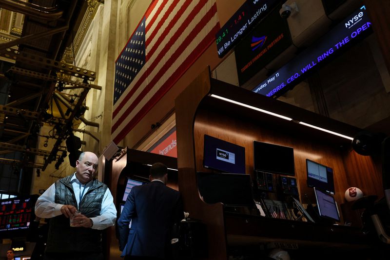 Indexes end down with tech-related shares; consumer sentiment falls