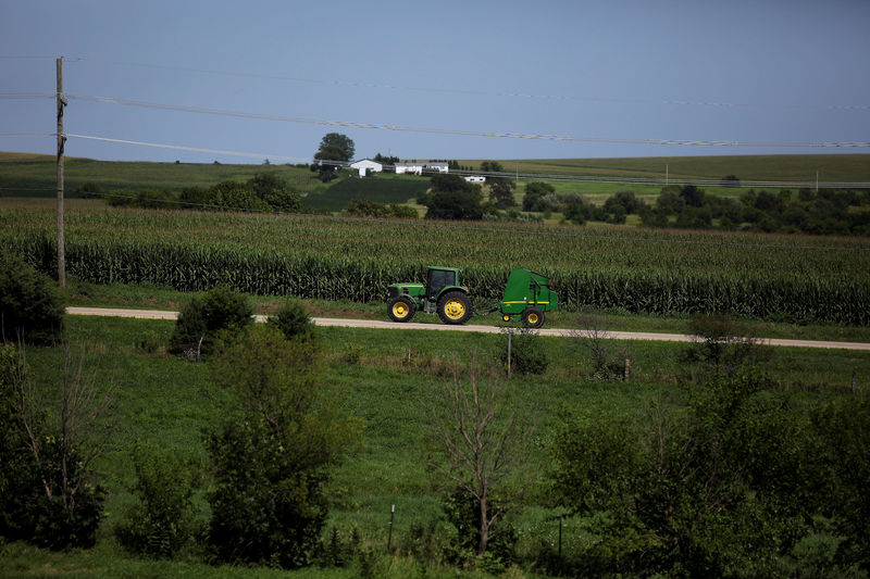 Iowa farmers wary of aid, trade wars but still turn out for Trump