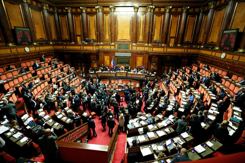 Italy government wins lower house confidence vote on budget, moves on to Senate