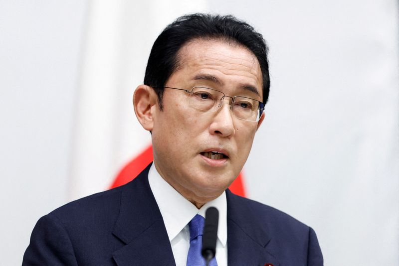 Japan drops target date to balance budget in mid-year draft roadmap