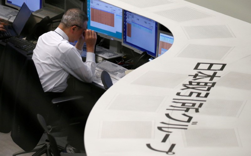 Japan fund managers trim stocks exposure in January, still above average levels: Reuters poll